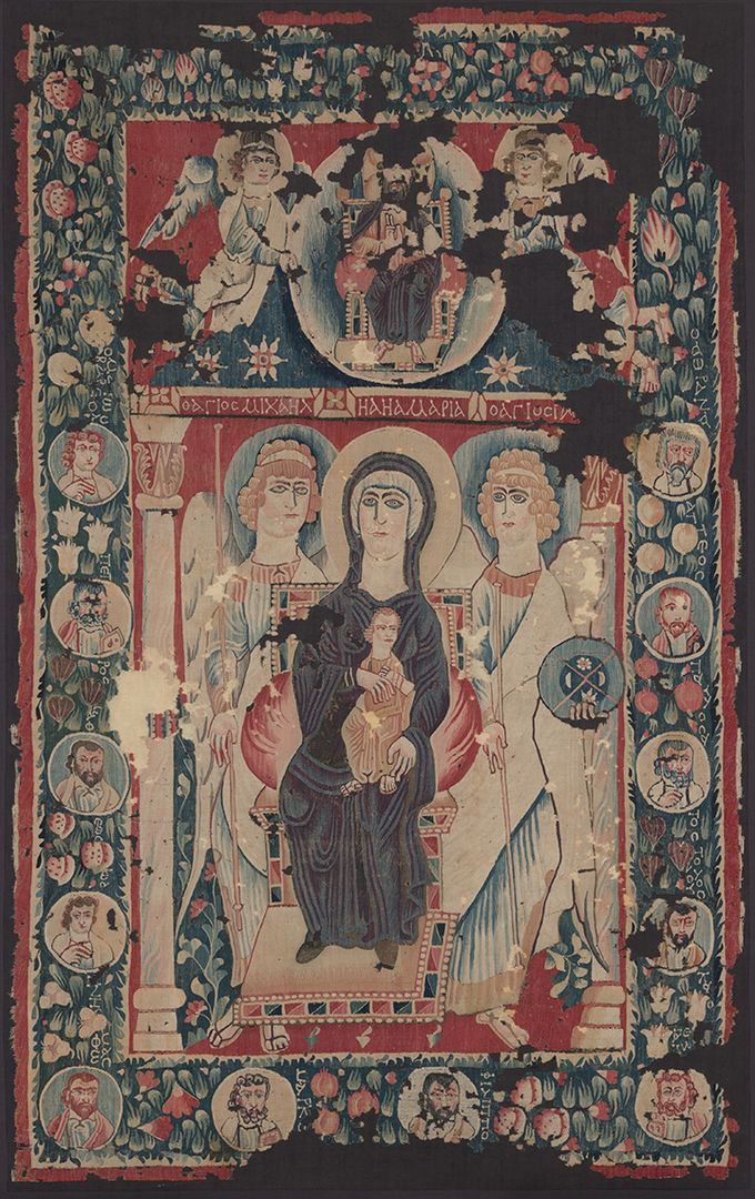 Byzantine-style religious tapestry featuring the madonna and child enthroned, flanked by angels and saints, with intricate borders containing medallions and floral motifs, embodying intricate medieval textile artistry.