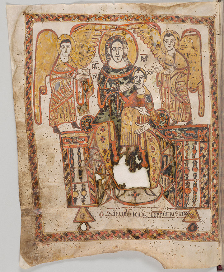 This is an ancient manuscript page showcasing a religious illustration with vibrant colors and ornate detail, featuring what appears to be a sacred figure seated on a throne, flanked by two angelic beings, amidst symbolic decor and inscriptions