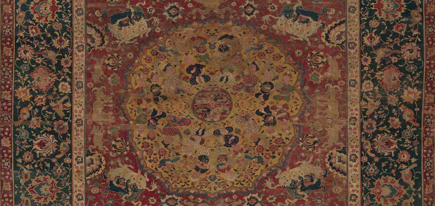 Detail of 16th-century Iranian carpet with various human and animal figures