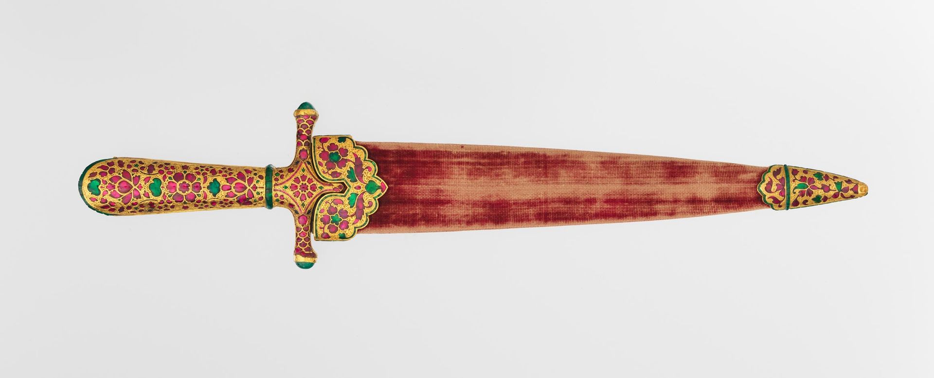 Dagger covered with red sheath and gold hilt, containing inlaid rubies and emeralds, designed in floral forms