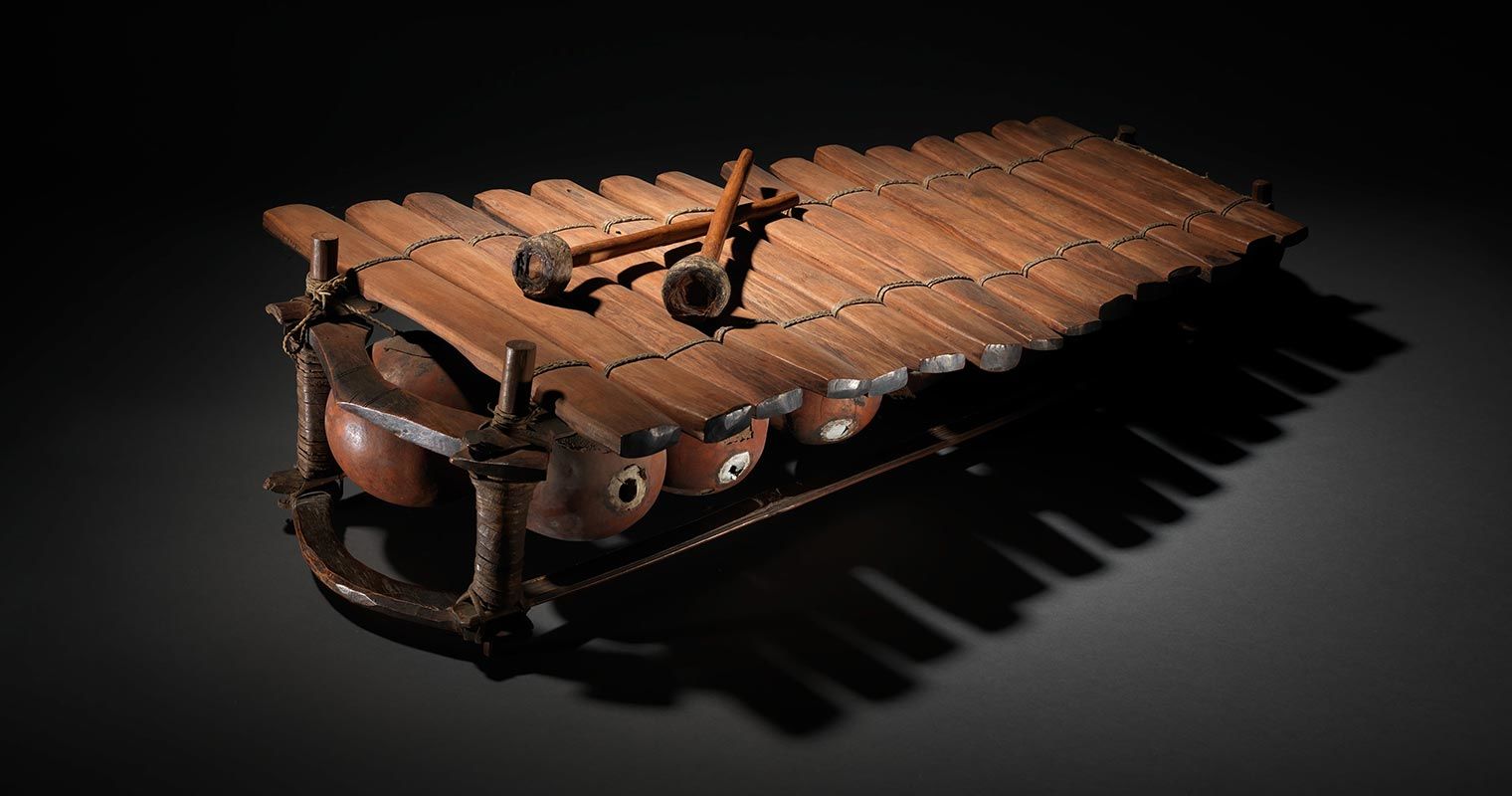 A xylophone like object with 15 gourd-resonated bars of wood.