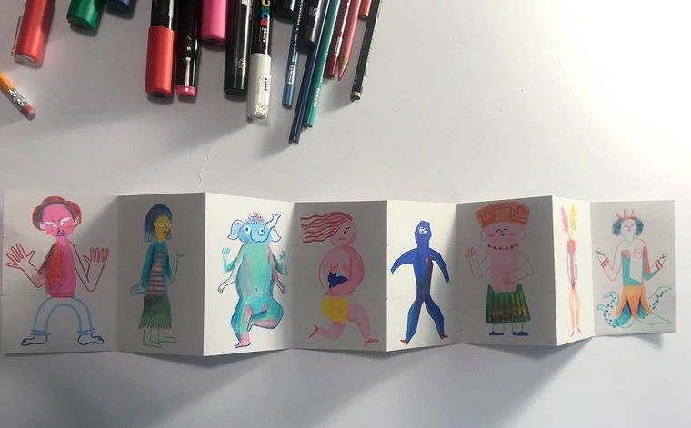 Eight fully drawn characters are on the folded paper strip.