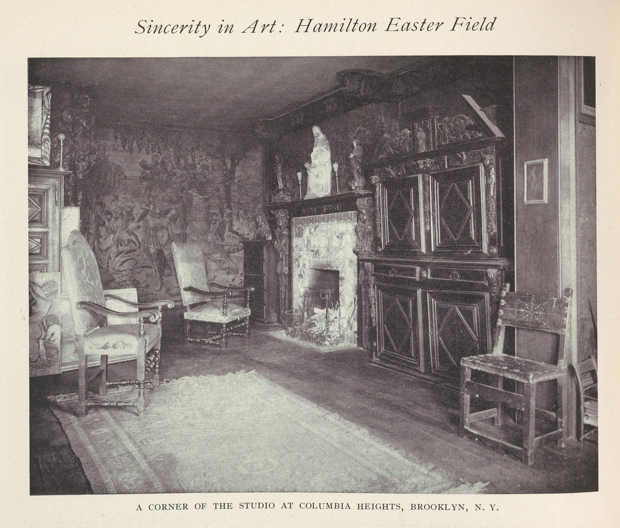 Black and white photograph of an old artist studio with old wooden furniture. Above the the photograph is the title Sincerity in Art: Hamilton Easter Field. Below it reads A Corner of the Studio at Columbia Heights Brooklyn. 