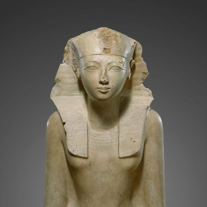 Bust of an Egyptian sculpture with headress