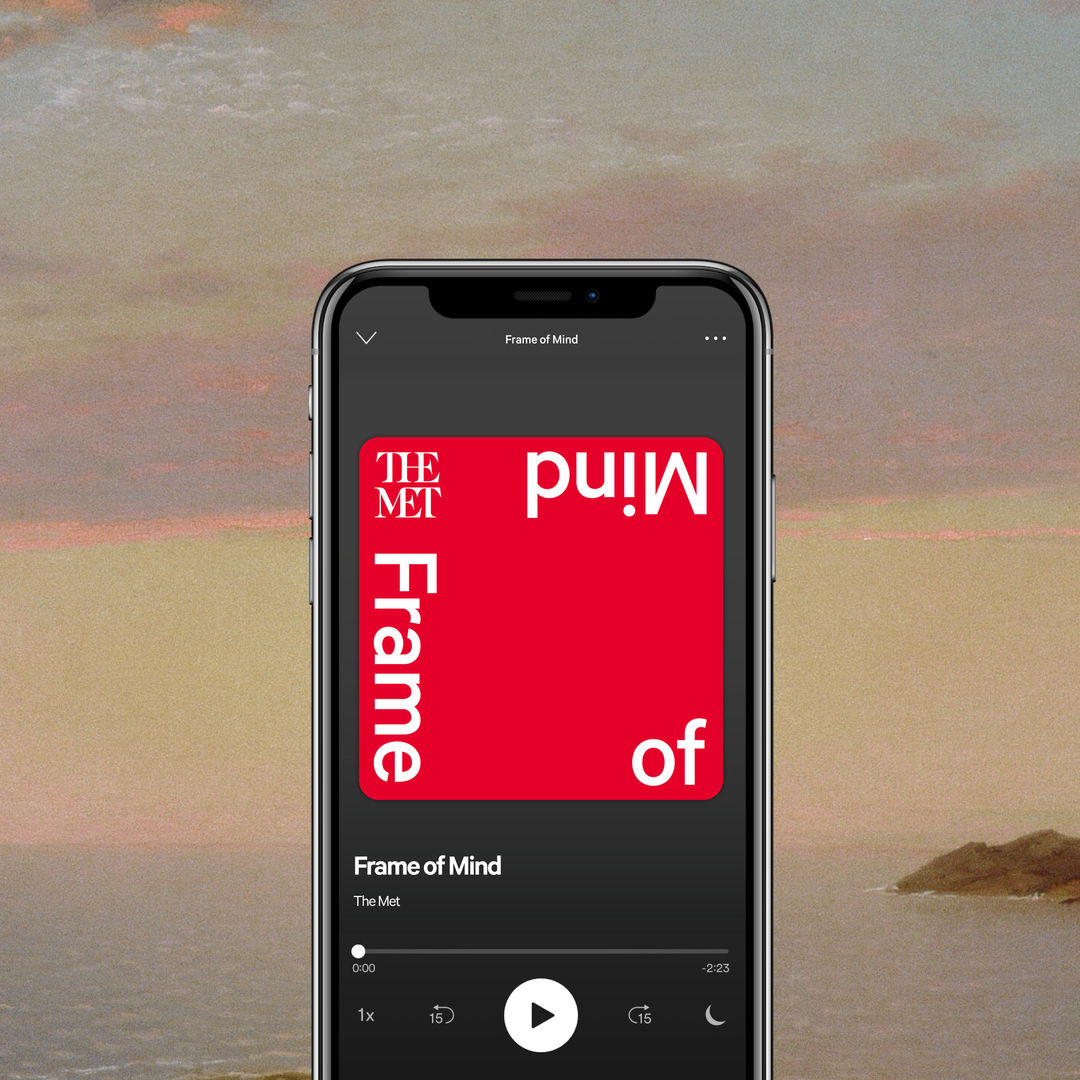 Cellphone showing a red square that reads Frame Of Mind. There is a calm ocean landscape in the background. 