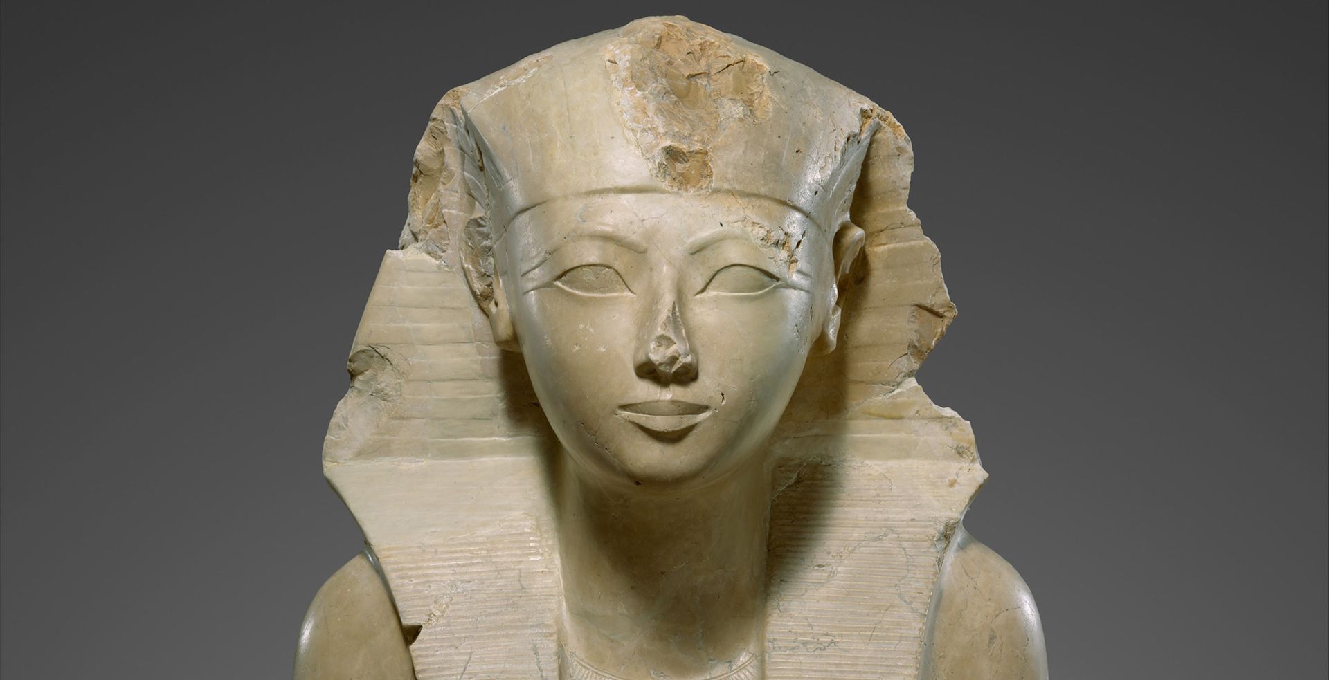 Detail of an ancient Egyptian limestone statue of Hatshepsut