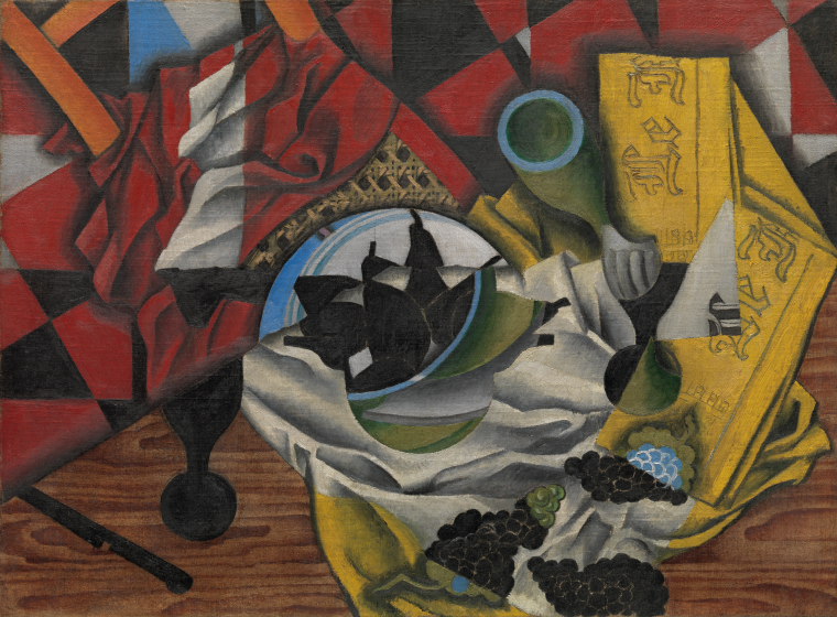 Cubist painting of pears, grapes, fabric, and other abstract shapes on a table