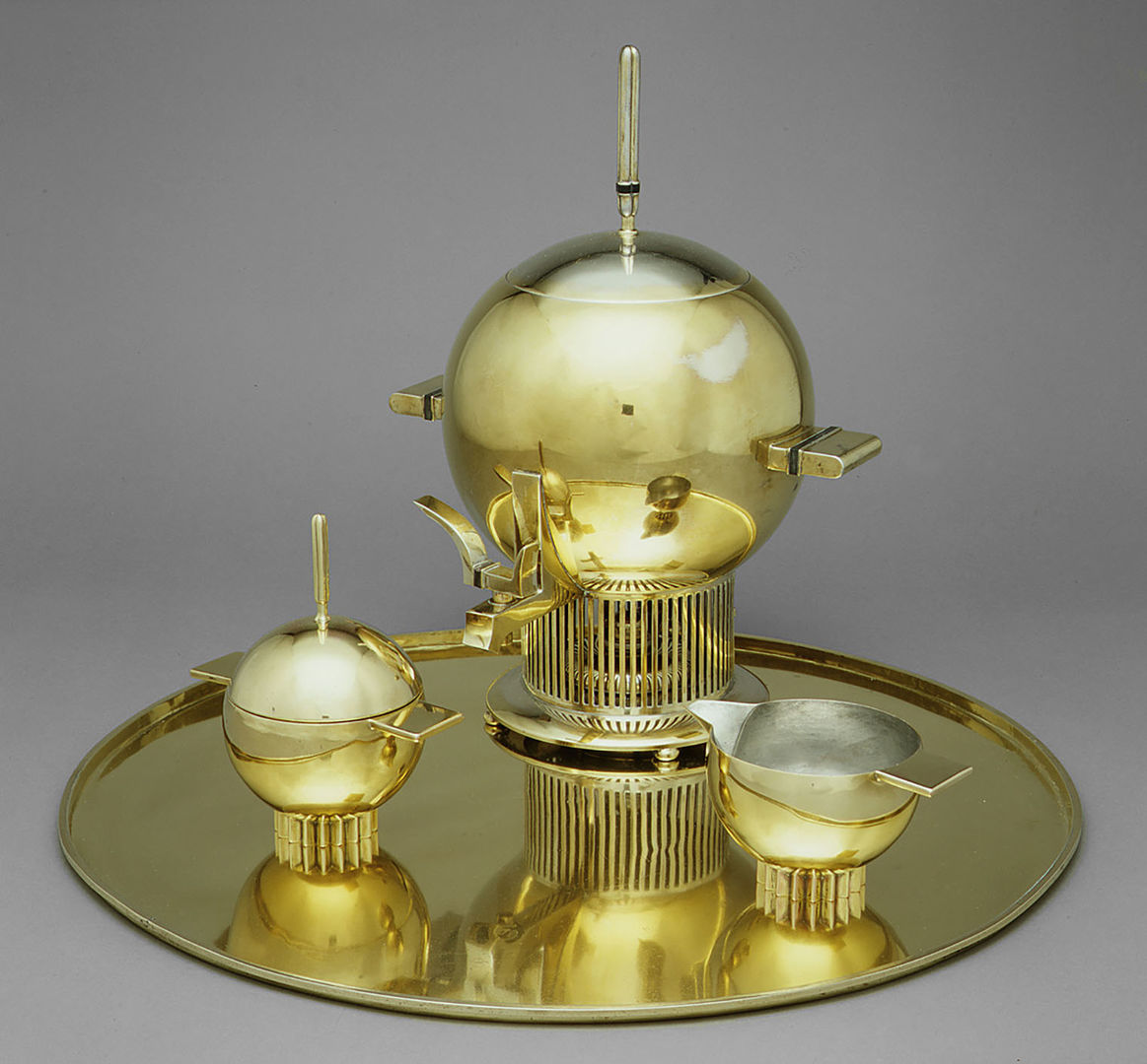 silver and brass tea set
