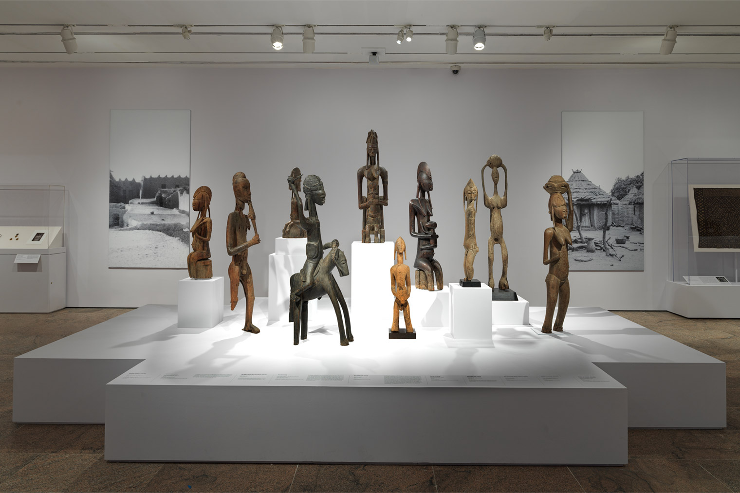 A gallery displaying a number of terracotta and wooden sculptures