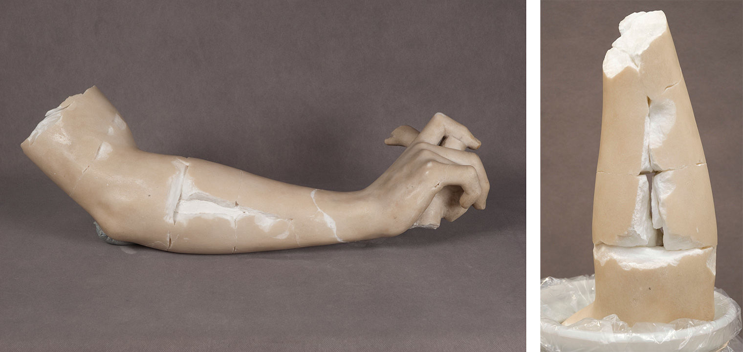 Two images showing portions of Adam's arm after the fall. Fractures are visible in brighter white against the marble, showing the break points. The arms lay against a gray background.