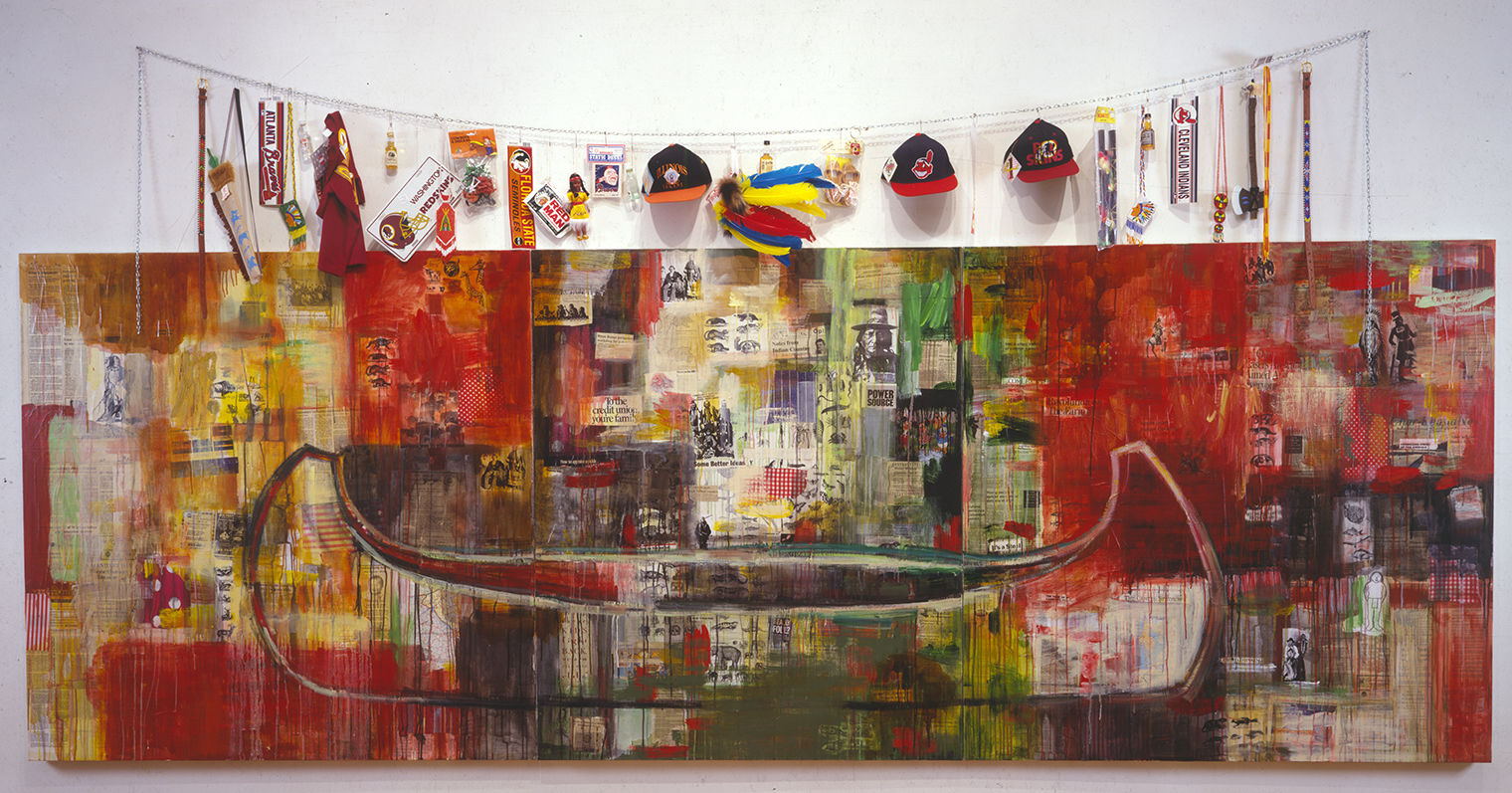 Mixed media artwork including a large-scale painting of a canoe. Anglo objects related to indigeneity in the US, such as a Washington Redskins baseball cap, are strung above the painting.